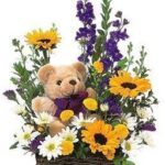 flower basket with teddy bear